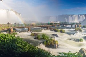 Foz Do Iguacu, Brazil - July 9, 2016: View of the world famous Iguazu Cataratas Falls with a rainbow in Brazil