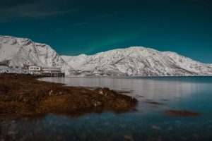 A,Marvelous,Scenery,Of,A,Frozen,Lake,Surrounded,By,Snowy