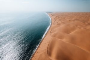 Aerial,Drone,,Where,Desert,Meets,The,Ocean,,Sandwich,Harbour,,Namibia,